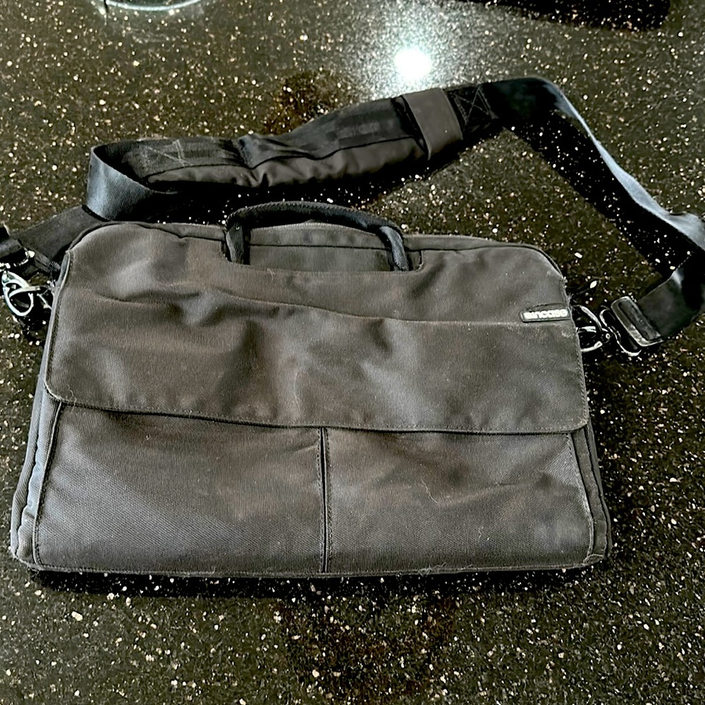 InCase black computer laptop carry bag with lots of pockets